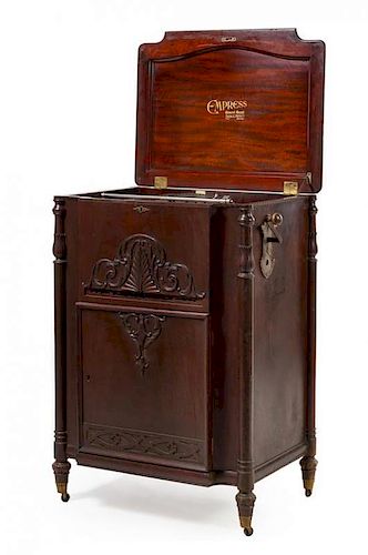 An Empress Concert Grand Floor Model Disc Music Box, Retailed by Lyon and Healy Height 43 x width 29 x depth 20 1/4 inches.