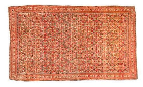 A Persian Wool Rug 6 feet 5 inches x 3 feet 11 inches.