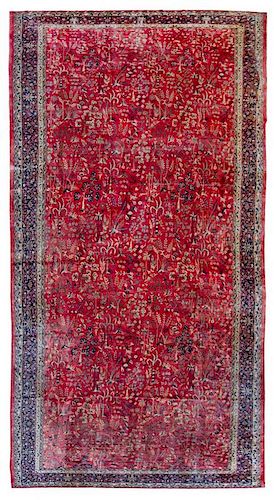 A Tabriz Wool Rug 26 feet 4 inches x 12 feet 5 inches.