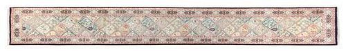 A Pakistani Wool Runner 17 feet 3 inches x 2 feet 6 inches.