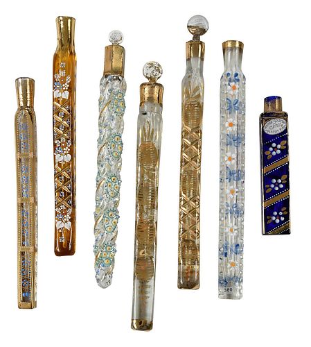 Seven Glass and Partial Gilt Lay Down Perfumes