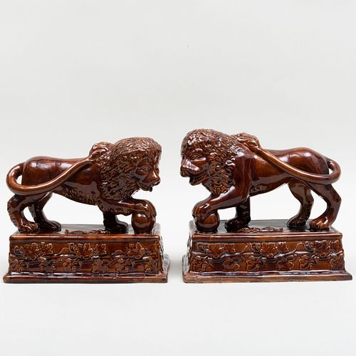 Pair of Glazed Earthenware Lions