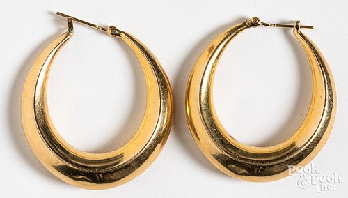 14K gold earrings.