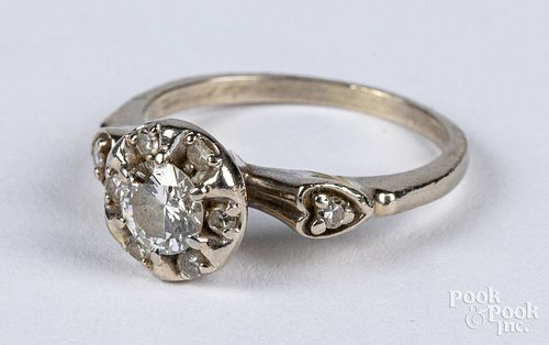14K gold and diamond halo ring