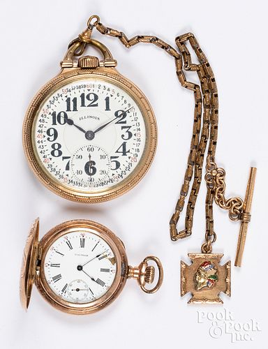 Two pocket watches, Illinois and Waltham.