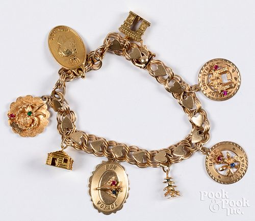 14K gold charm bracelet, with 14K and 18K charms