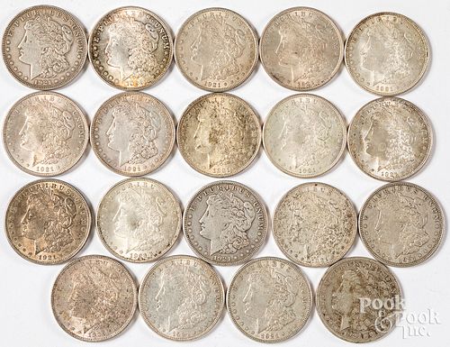 Nineteen 1921 Morgan silver dollars.