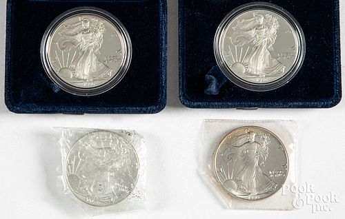 Four Liberty Eagle 1 ozt. fine silver coins.