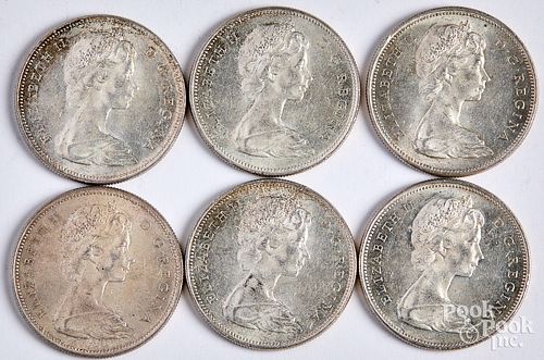 Six 1965 Canada silver dollars.