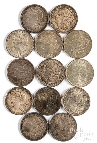 Twenty-six silver dollars