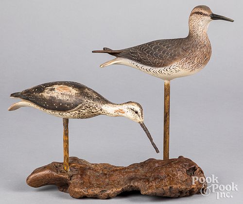 Two carved and painted shorebird decoys mounted
