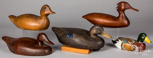 Five carved duck decoys