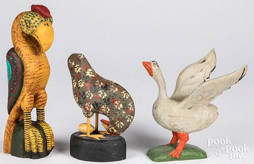 Three folk art carved and painted wood birds