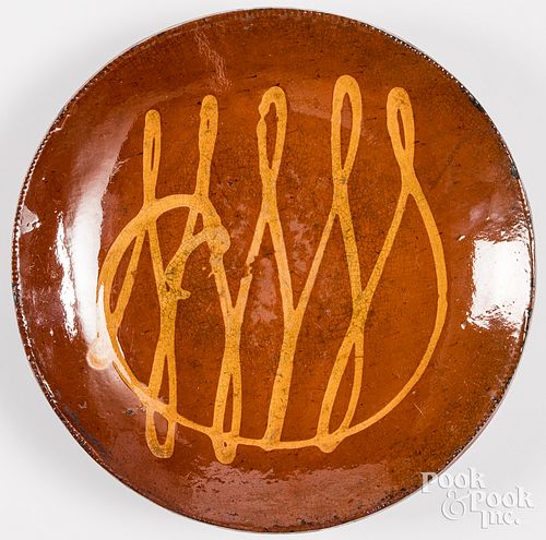 Pennsylvania slip decorated redware plate
