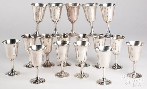 Seventeen sterling silver goblets