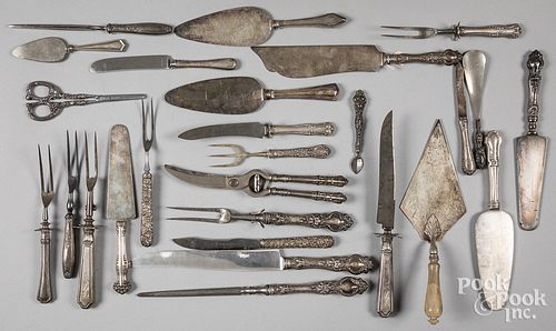 Silver handled serving utensils.