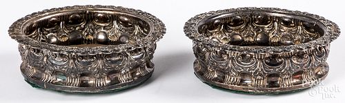 Pair of English silver wine coasters, 19th c.