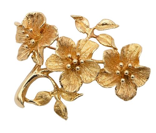 14 Karat Gold Triple Flower Brooch, height 2 inches, 18.4 grams.