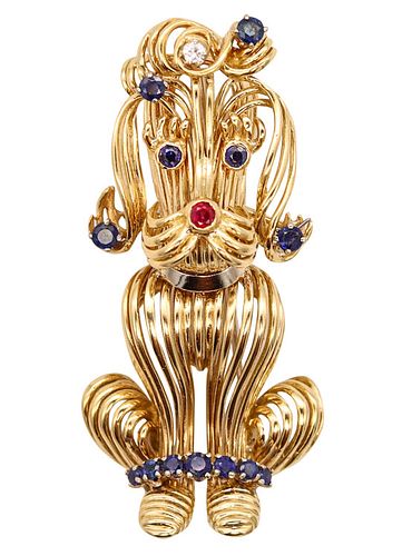 Tiffany & Co.  Dog brooch in 18k Gold with 1.34 Cts in Sapphires & Ruby
