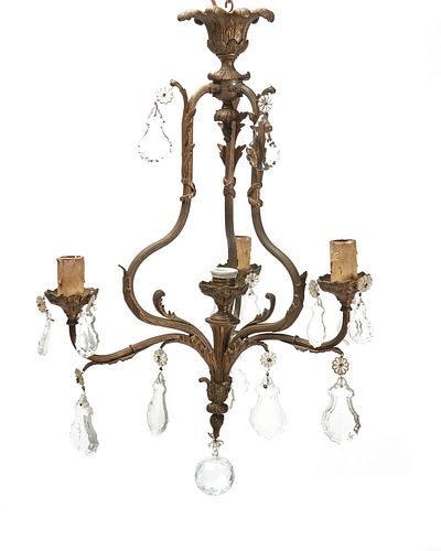 A bronze and cut crystal chandelier