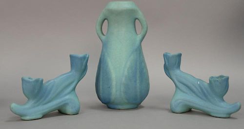 Three piece Van Briggle pottery lot including a vase (ht. 9 in.) and a pair of double candlesticks (ht. 4 1/2 in.).