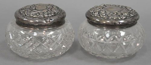 Pair cut crystal jars with sterling silver covers. dia. 4 1/2 in.; ht. 3 in.
