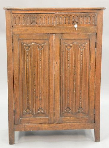 Oak Jacobean style cabinet with two drawers over two doors with three fitted interior drawers, early 20th century. ht. 59 in.; wd. 4...