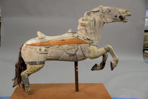 Carousel horse, partially restored (stripped). ht. 44 in.; lg. 54 in.