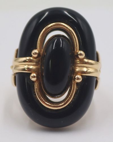 JEWELRY. 14kt Gold and Onyx Cocktail Ring.