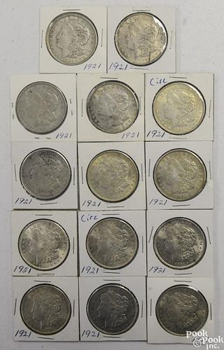 Sixteen Morgan silver dollars, 1921, VG-AU.