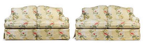 A Pair of Custom Upholstered Two-Seat Sofas Height 35 x width 65 x depth 29 inches.