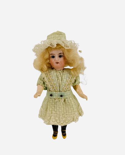 Armand Marseille "Daisy Dressed Doll" in original box. 7" all original bisque socket head girl with mohair wig, glass sleep eyes, one-stroke brows, op