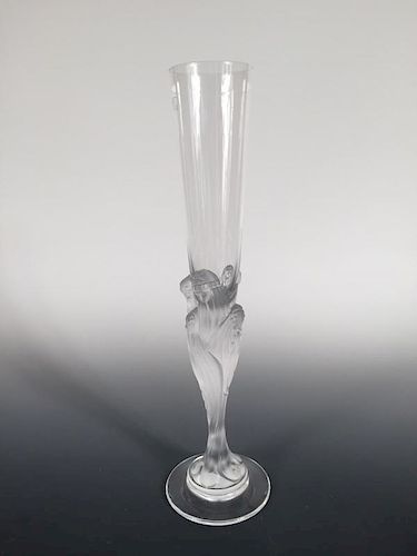An Erte glass 'Majestique' champagne flute, the stem moulded and frosted with seven veiled women, et