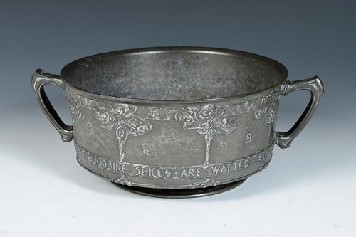 David Veazey for Liberty & Co., a Pewter twin handled rose bowl, cast in low relief with rose trees