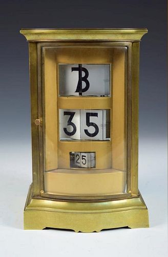 A 20th century brass cased four glass ticket clock, the silvered tickets with black Arabic numerals,