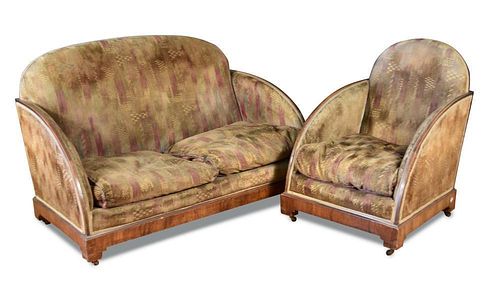 An Art Deco walnut framed three piece suite, comprising two-seater sofa and two armchairs, each with