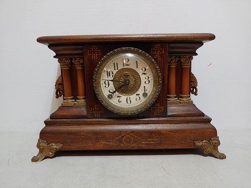 Decorative wood/brass chiming mantel clock