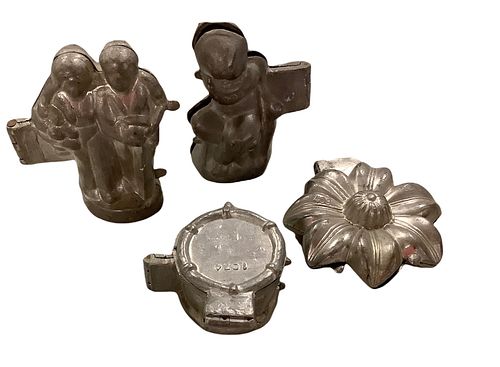 Lot of 4 candy molds.