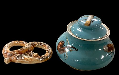 Heritage Culinary Artifacts Ceramic Figural Pretzel Flask. Jar 6" high with pipe tobacco pictures on it made by T&W Co.