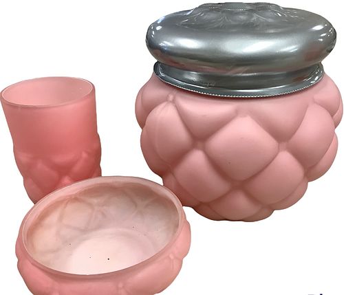 Lot of 3 pink matte quilted matte glass items including a biscuit jar @ 6" tall, 6" wide, a cup @ 4" tall and a dish @ 4 1/2" wide. Metal lid of biscu