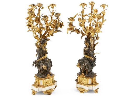 A Pair of Napoleon III Gilt Bronze Figural Candelabras