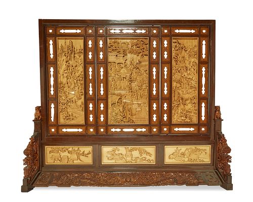 A monumental Chinese carved wood floor screen