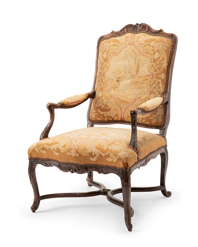 A French Louis XV-style armchair