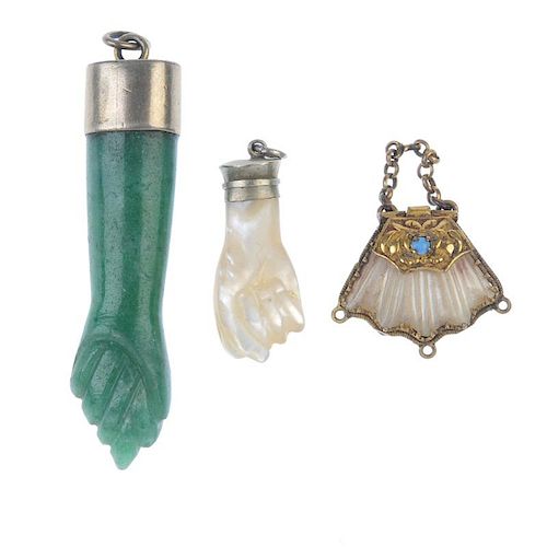 Two gem hand pendants and a late 19th century mother-of-pearl hinged purse pendant. To include an av