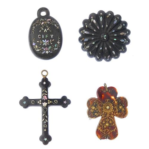 A selection of late Victorian tortoiseshell jewellery. To include a mother-of-pearl inlay cross pend