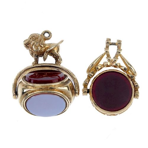 Two swivel fobs. The first of circular outline, with carnelian to one side of the swivel panel and b