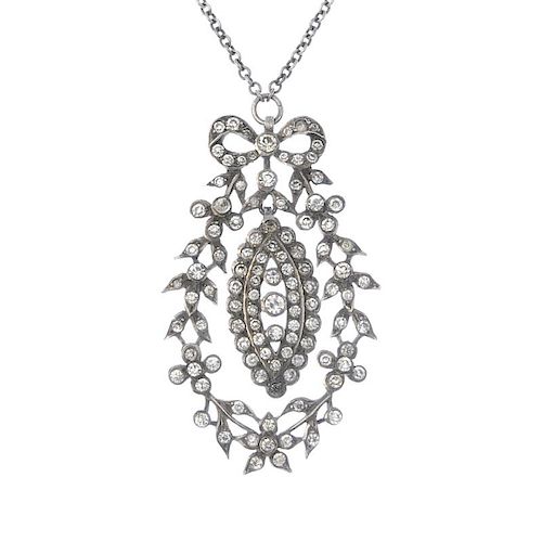 A mid 20th century continental silver paste pendant. The circular-shape colourless paste marquise-sh