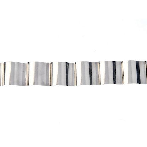 GEORG JENSEN - a 'Surf' bracelet by Nanna Ditzel. Each of the seven links designed as a curved squar