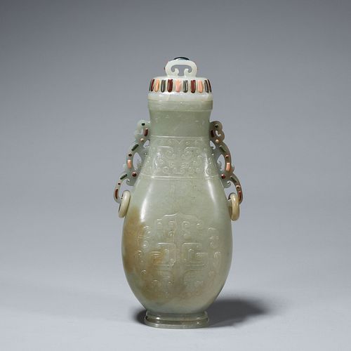 A double-eared jade vase with suspending rings