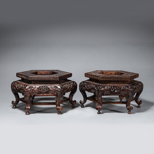 A pair of hexagonal rosewood pedestals